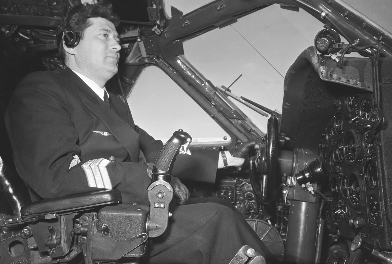 Squadron commander I. Orlovets in the cockpit of a Tu-104